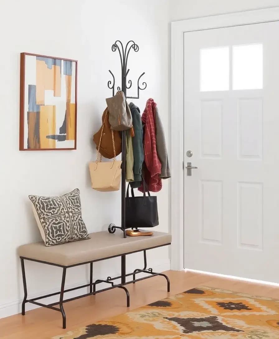 An entryway featuring a sleek, modern coatrack made of metal, with coats and bags hanging neatly on it. The rack is positioned near the door, and the surrounding decor includes a small bench and a decorative rug, creating a functional yet stylish space.